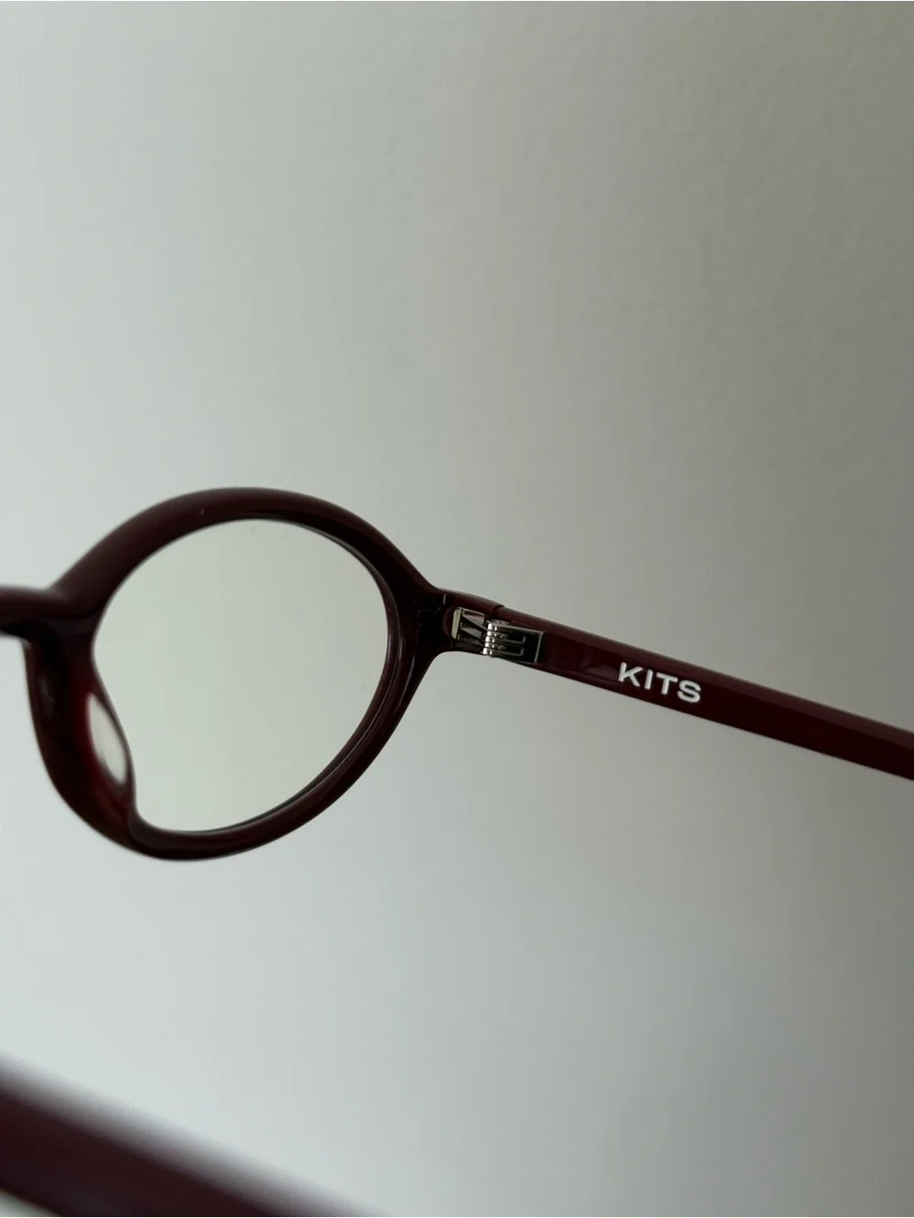 KITS Wisp eyeglasses in the Shiny Wine (KRD05) colorway